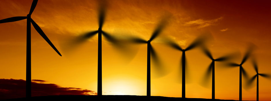windmills during sunset